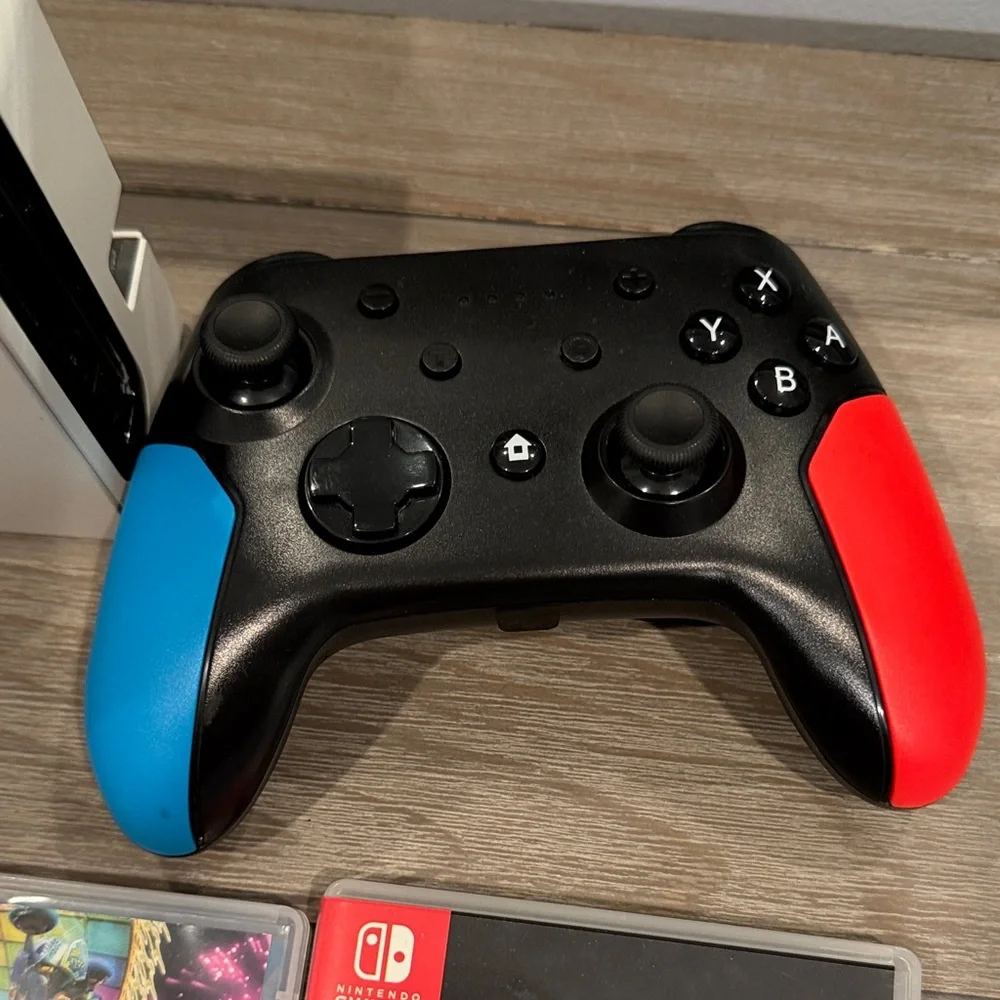 Nintendo Switch Console with White Dock and Red/Blue Controllers